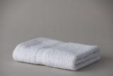 Sinigle White Thomaston Mills Cam Towel Folded.