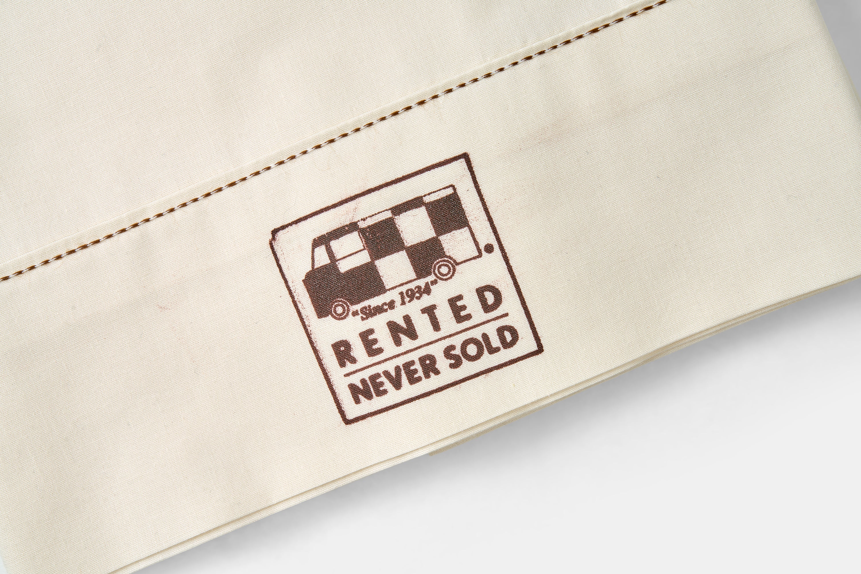 linen with a printed logo and text on a light background