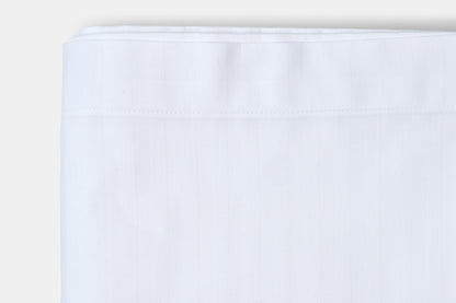 White fabric swatch on a light gray background