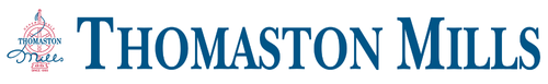 Thomaston Mills logo with blue text and a small logo on the left on a white background