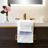 TM Plush by Thomaston MIlls towels floded and draped over a sink